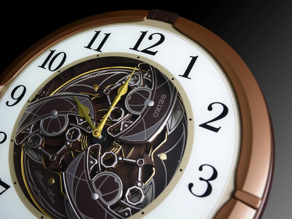 Seiko QXM380BRH “Mechanical” Melodies in Motion Dancing Dial Musical Wall Clock with 18 Songs