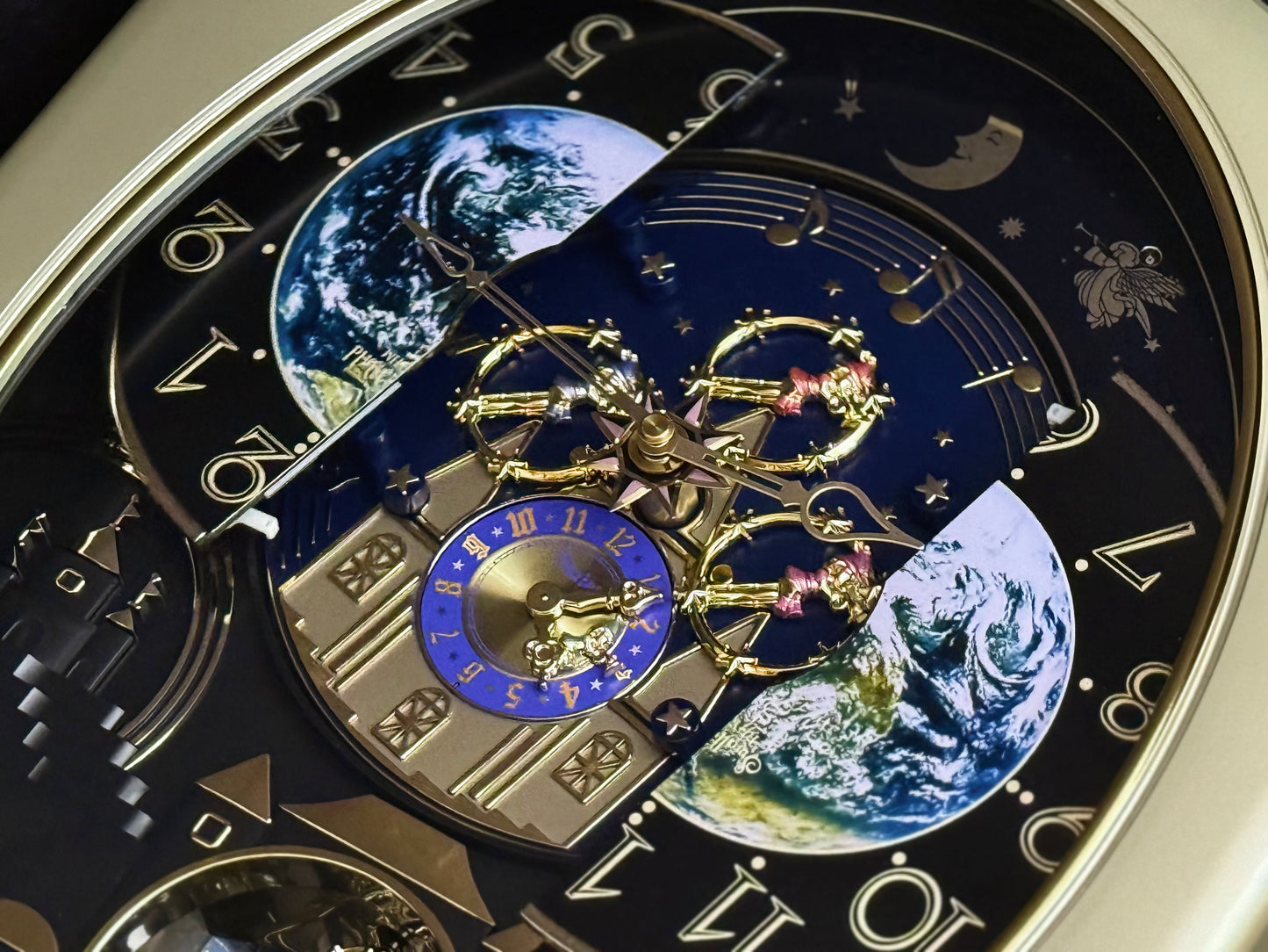 Rhythm “Peaceful Cosmos Entertainer” Moving Earth Dial Magic Motion Musical Wall Clock with Popular Melodies - 4MH839WB19
