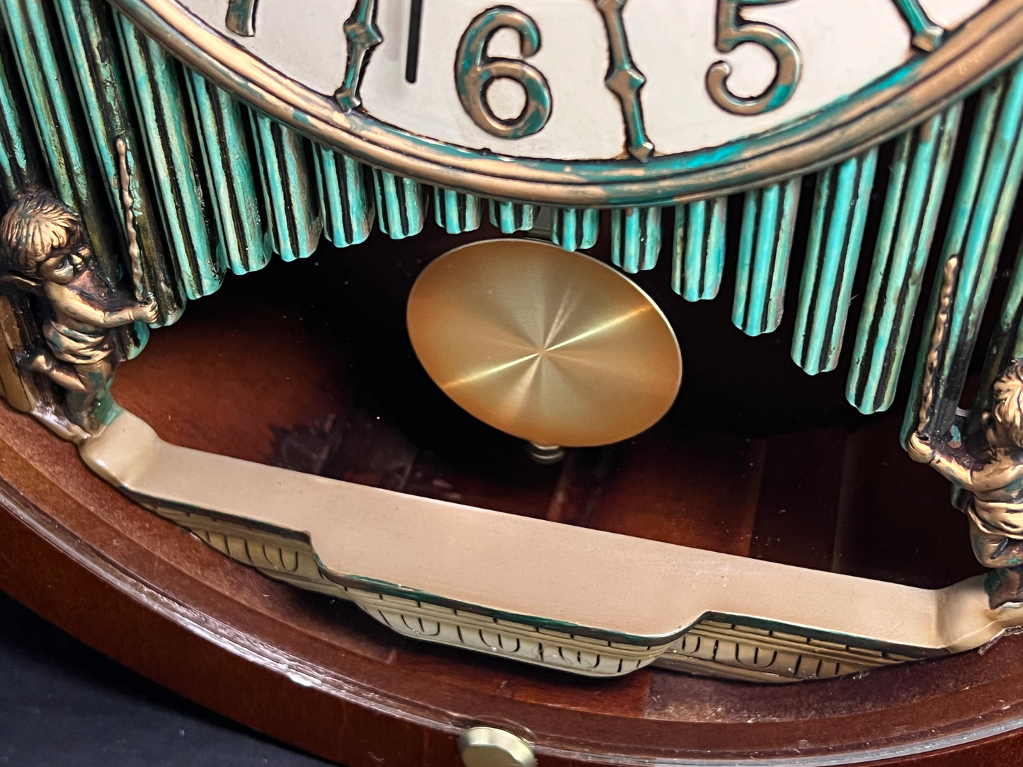 Rhythm “CTS Sundial” Gothic Wooden Musical Motion Pendulum Wall Clock with Popular Melodies - CMJ336UR06