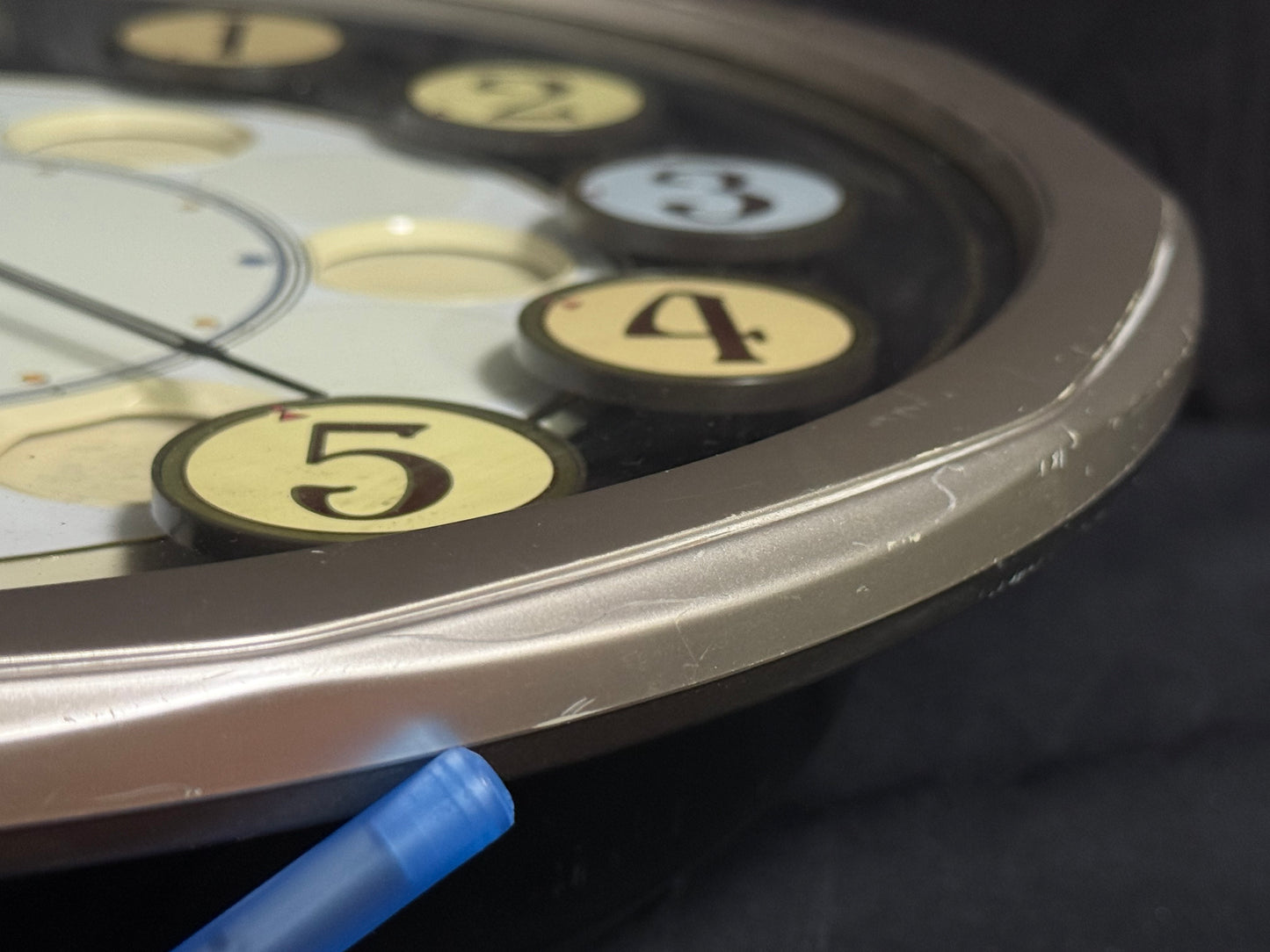 Seiko QXM106SRH "Twirling Numbers" Melodies in Motion Musical Wall Clock with Moving Dial