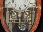 Rhythm “CTS Florence” Inlaid Wooden Musical Motion Pendulum Wall Clock with Popular Melodies - CMJ338UR06