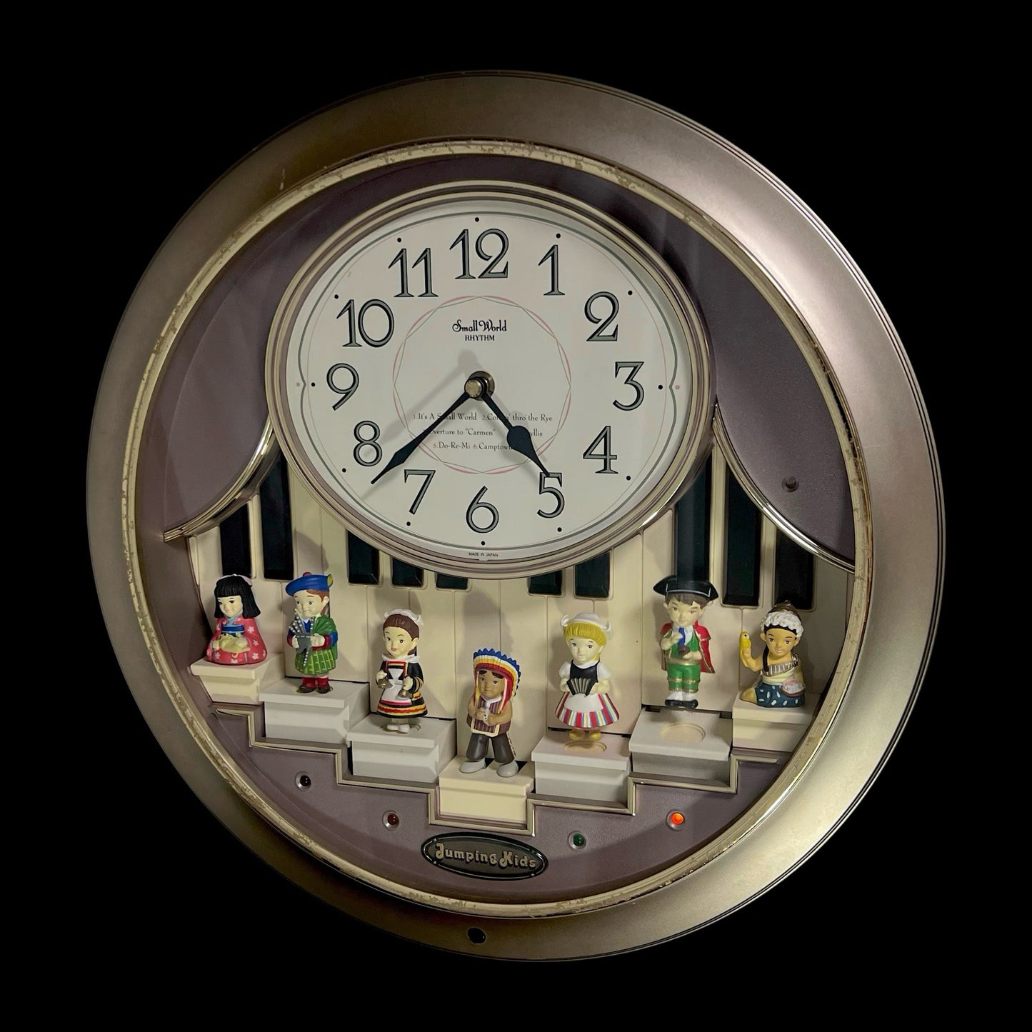 Rhythm “Jumping Kids” Magic Motion Musical Wall Clock with Moving Figurines and Piano Keys - 4MH721RH18