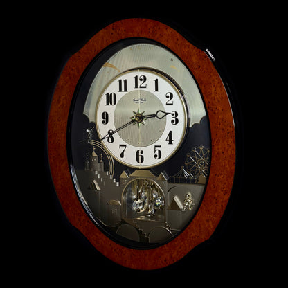 Rhythm “DWS Timecracker” Moving Dial Magic Motion Musical Wooden Wall Clock with Popular Melodies - 4MH752-R06