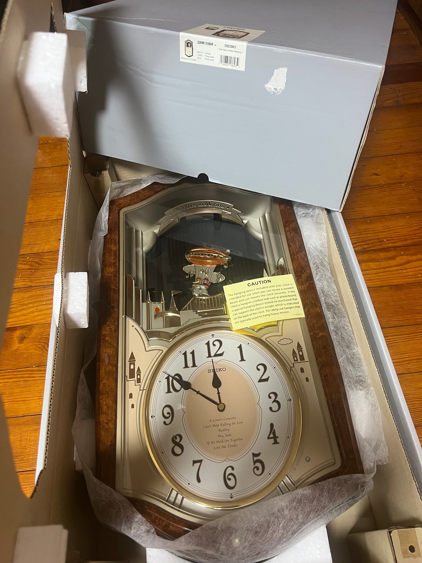 Seiko QXM135BRH "Lover’s Castle" Melodies in Motion Musical Moving Wall Clock with Popular Melodies