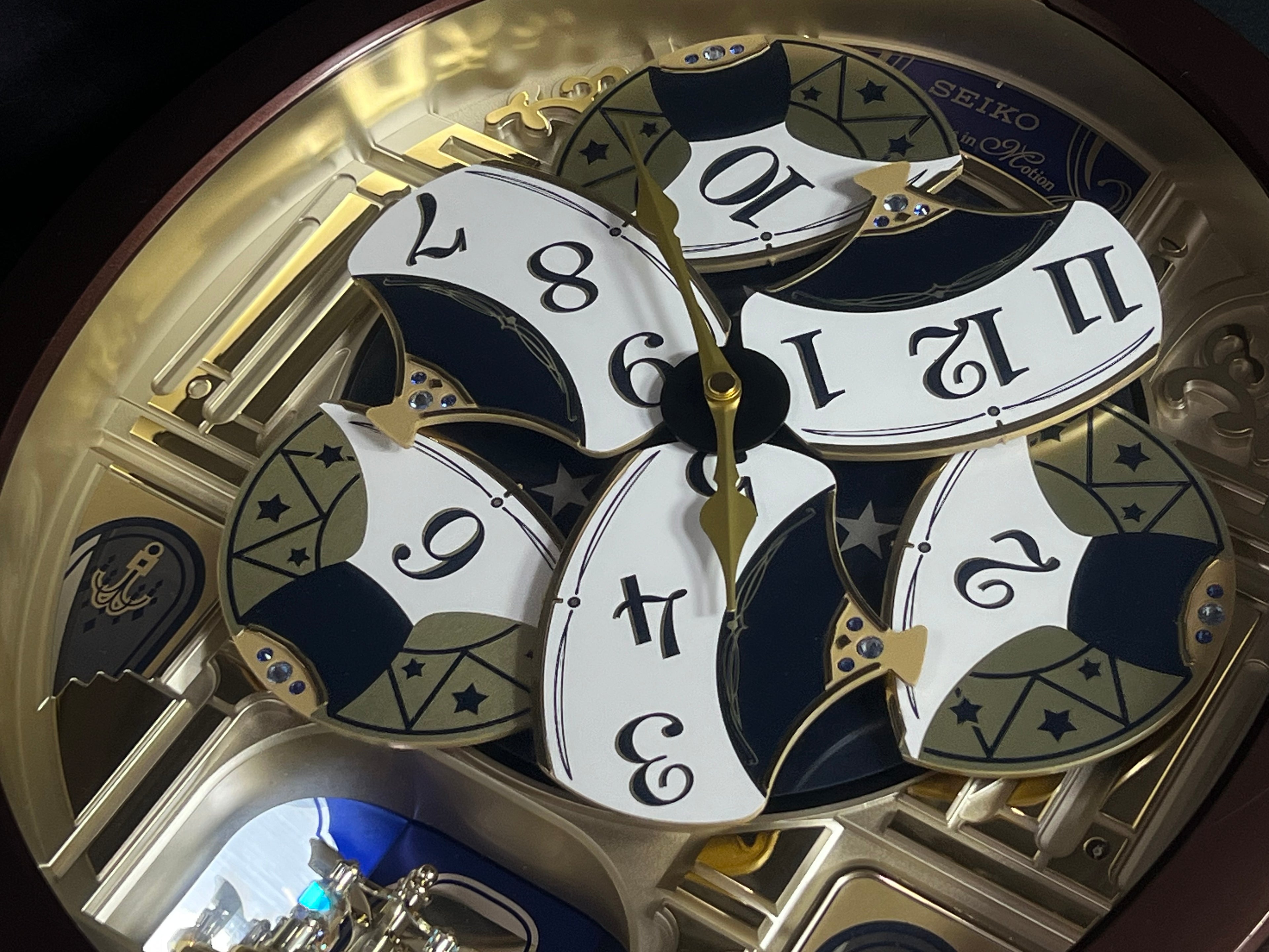 Seiko QXM541BRH "2014 Special Collector's Edition" Melodies in Motion Dancing Dial Musical Wall Clock with Music by The Beatles