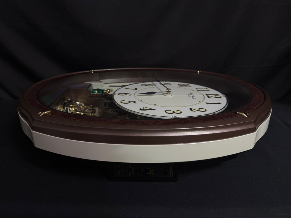 Rhythm "Harmony Blessing" Moving Dial Magic Motion Musical Wall Clock - 4MH423WR23