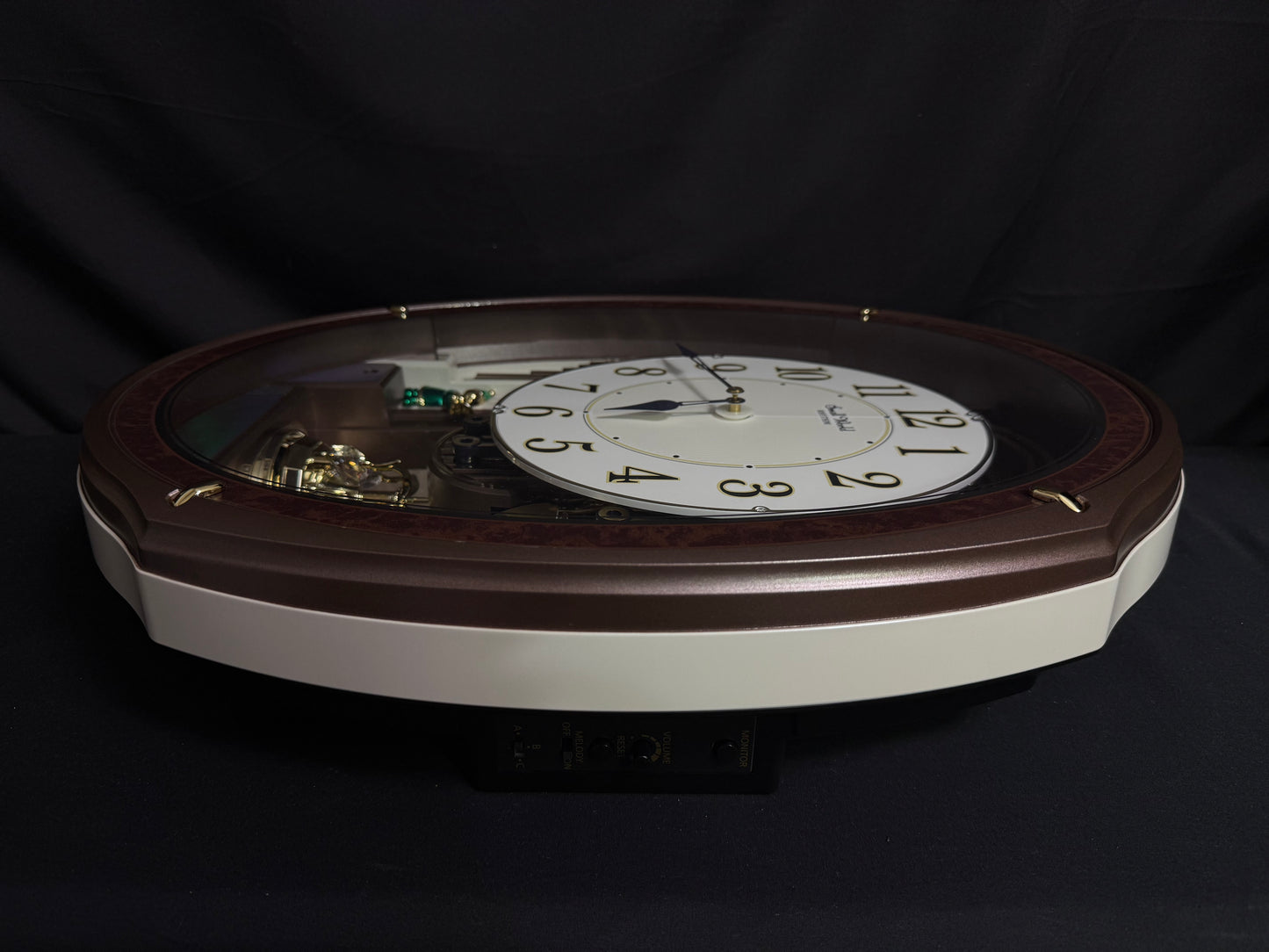 Rhythm "Harmony Blessing" Moving Dial Magic Motion Musical Wall Clock - 4MH423WR23