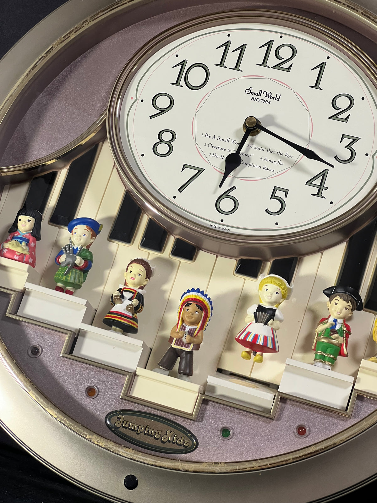 Rhythm “Jumping Kids” Magic Motion Musical Wall Clock with Moving Figurines and Piano Keys - 4MH721RH18