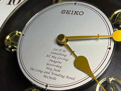 Seiko QXM134BRH "2005 Special Collector's Edition" Melodies in Motion Musical Moving Wall Clock with Music by The Beatles