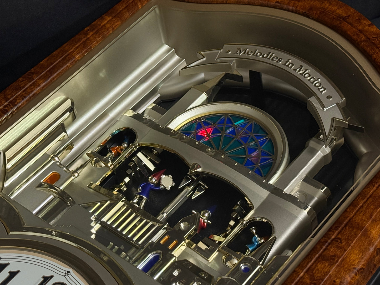 Seiko QXM135BRH "Lover’s Castle" Melodies in Motion Musical Moving Wall Clock with Popular Melodies