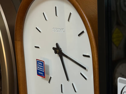 Seiko QXC247BLH "Sven" Modern Wooden Pendulum Wall Clock with Raised Numerals