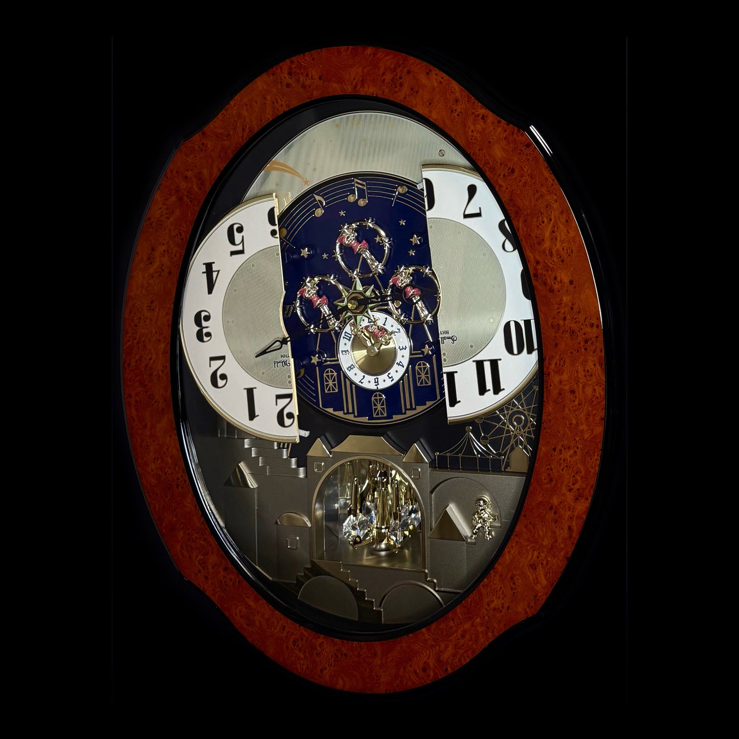 Rhythm “DWS Timecracker” Moving Dial Magic Motion Musical Wooden Wall Clock with Popular Melodies - 4MH752-R06