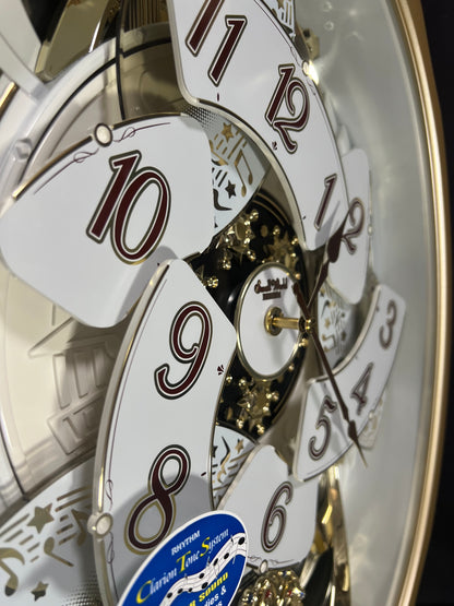 Rhythm “Marvelous” Magic Motion Musical Wall Clock with Moving Dial - 4MH842WD18