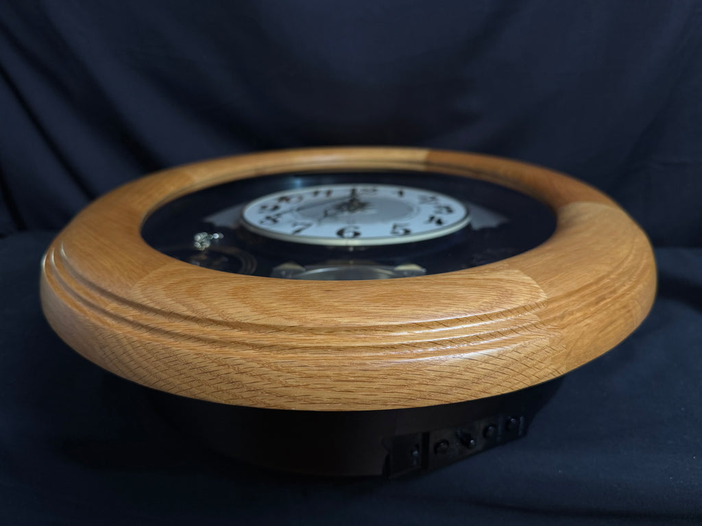Rhythm "Timecracker Golden Oak" Moving Dial Magic Motion Musical Wooden Wall Clock with Popular Melodies - 4MH782-R07