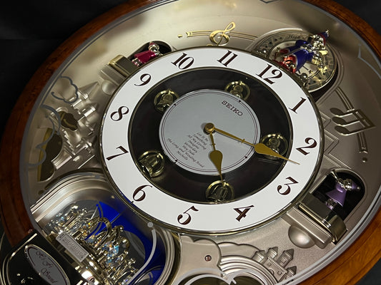 Seiko QXM134BRH "2005 Special Collector's Edition" Melodies in Motion Musical Moving Wall Clock with Music by The Beatles