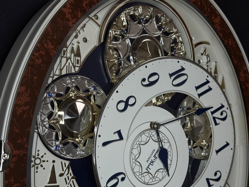 Rhythm "Gala III" Magic Motion Musical Wall Clock with Rotating Dial - 4MH447WU23