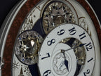 Rhythm "Gala III" Magic Motion Musical Wall Clock with Rotating Dial - 4MH447WU23