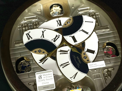 Seiko QXM371BRH “Castle Windows” Melodies in Motion Dancing Dial Musical Wall Clock