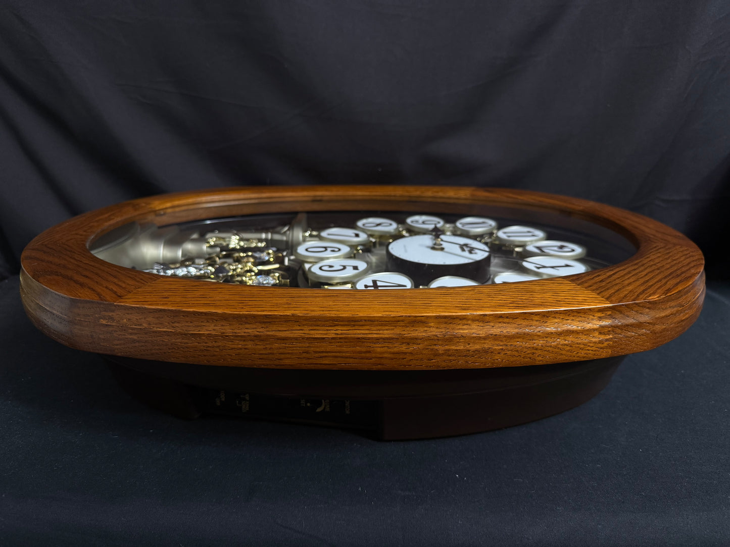 Rhythm "SSS Encore" Magic Motion Musical Wooden Wall Clock with Animated Moving Dial and Popular Melodies - 4MH810-R06