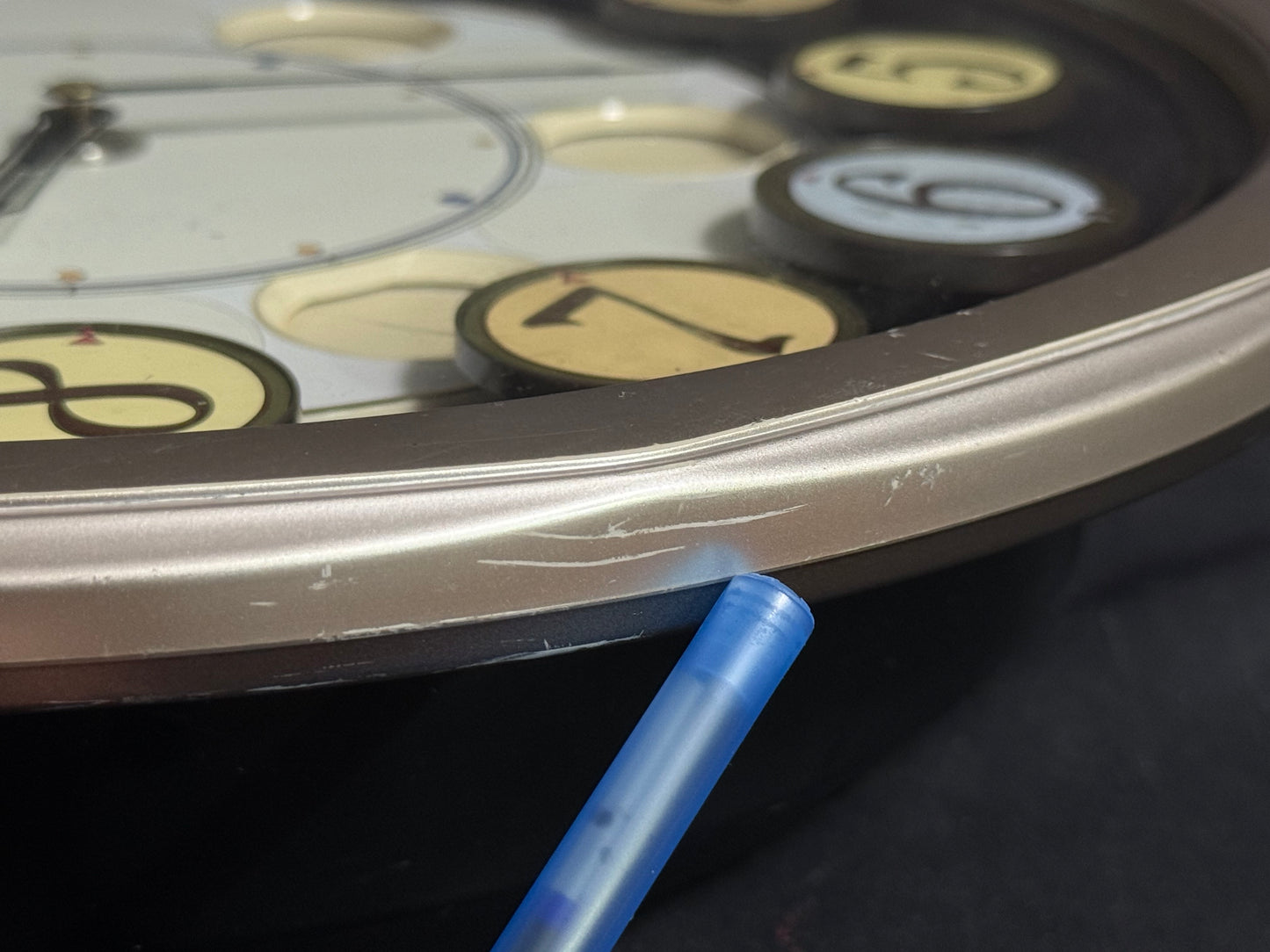 Seiko QXM106SRH "Twirling Numbers" Melodies in Motion Musical Wall Clock with Moving Dial