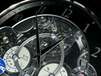 Rhythm “Chronograph (Black/Silver)” Skeletonized Dial Magic Motion Musical Wall Clock with Moving Gears - 4MH442WU08