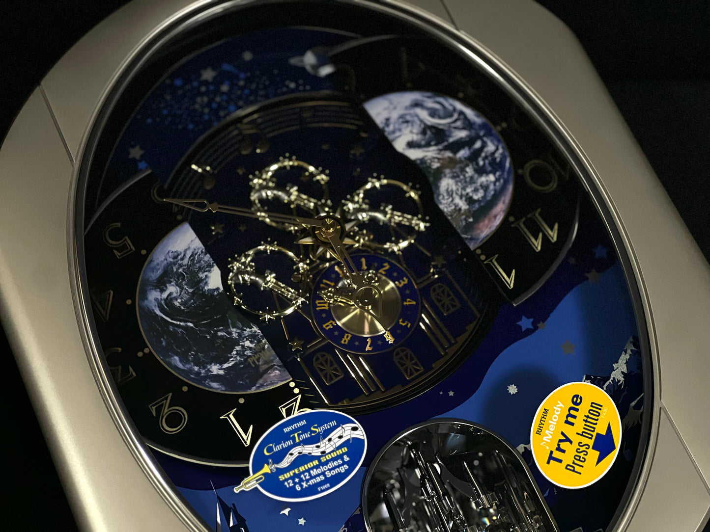 Rhythm “Peaceful Cosmos II” Moving Earth Dial Magic Motion Musical Wall Clock - 4MH408WU19