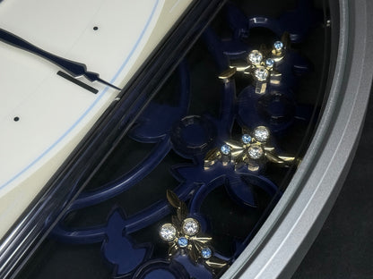 Seiko QXM158SRH "Sparkling Crystals" Melodies in Motion Musical Decorative Pendulum Wall Clock