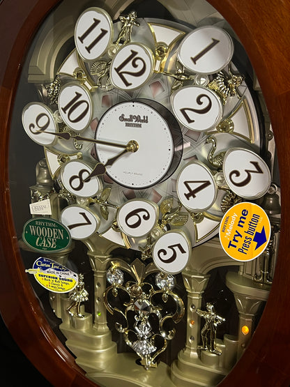 Rhythm "Grand Encore Legend" Magic Motion Musical Wooden Wall Clock with Animated Moving Dial and Music by The Beatles - 4MH834WB06