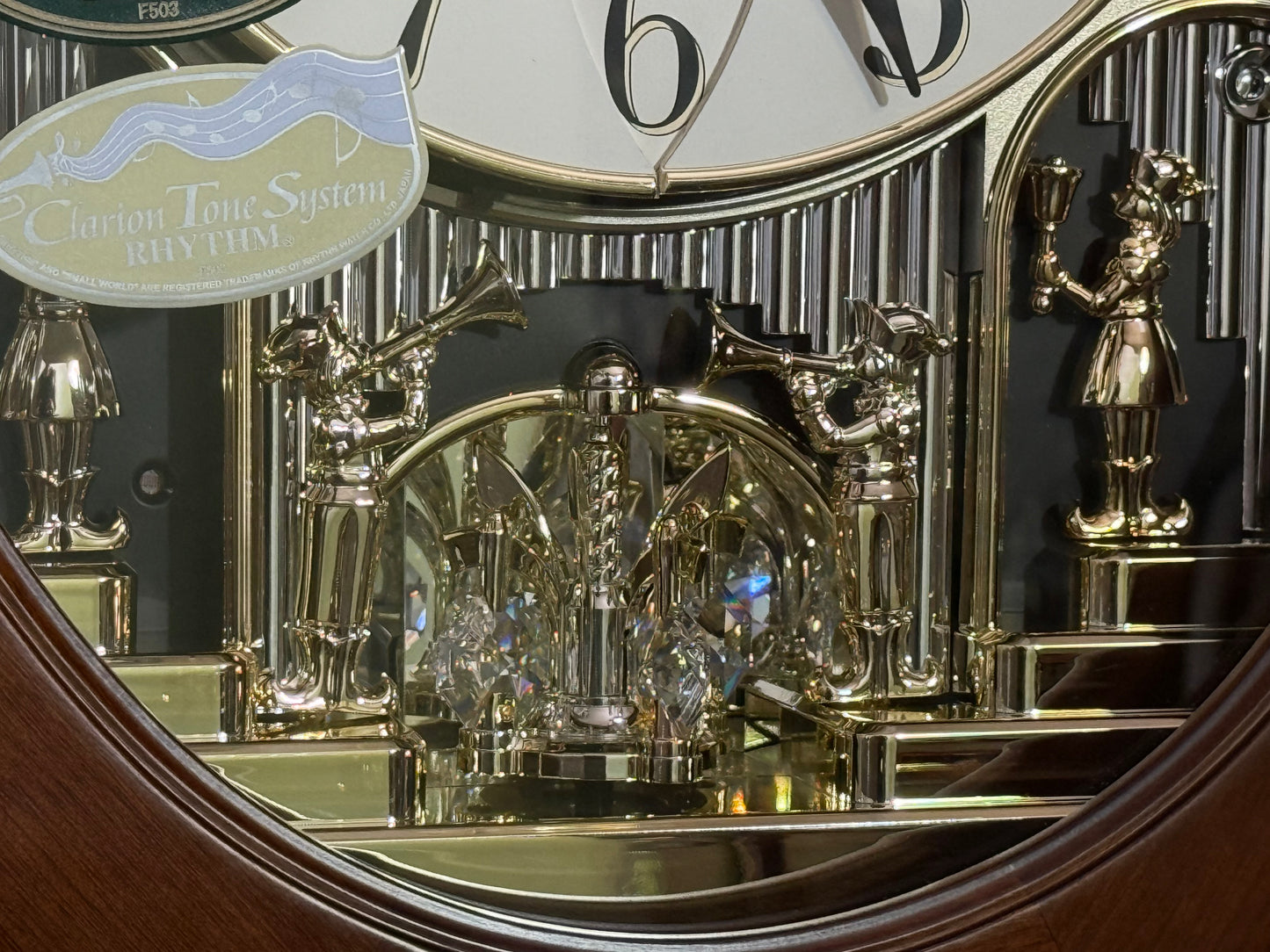 Rhythm "CTS Nostalgia" Moving Dial Magic Motion Musical Wooden Wall Clock with Popular Melodies - 4MH780-R06