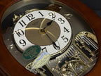 Rhythm "CTS Nostalgia" Moving Dial Magic Motion Musical Wooden Wall Clock with Popular Melodies - 4MH780-R06