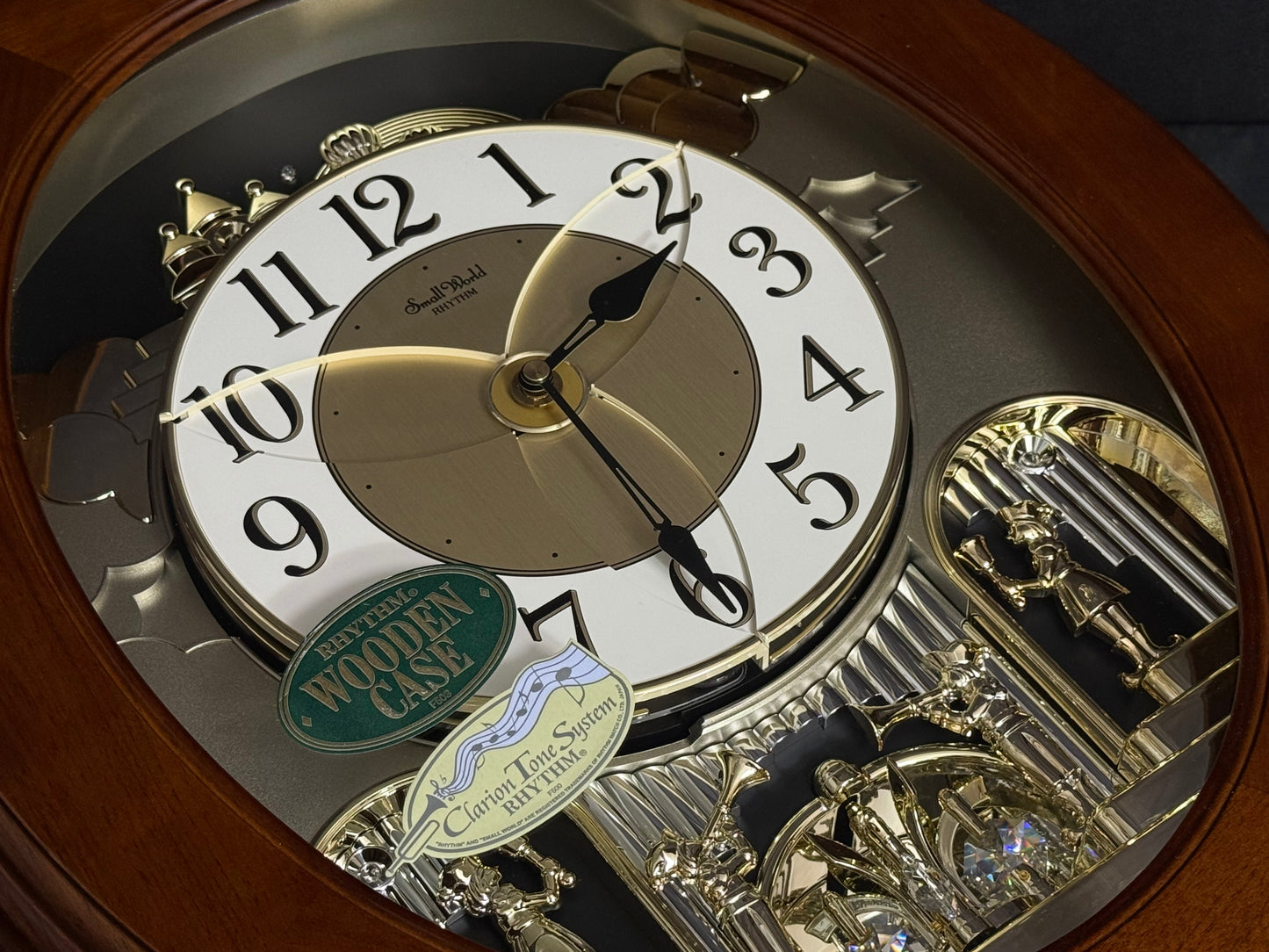 Rhythm "CTS Nostalgia" Moving Dial Magic Motion Musical Wooden Wall Clock with Popular Melodies - 4MH780-R06