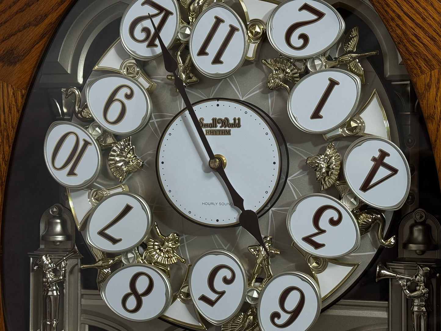 Rhythm "SSS Encore" Magic Motion Musical Wooden Wall Clock with Animated Moving Dial and Popular Melodies - 4MH810-R06