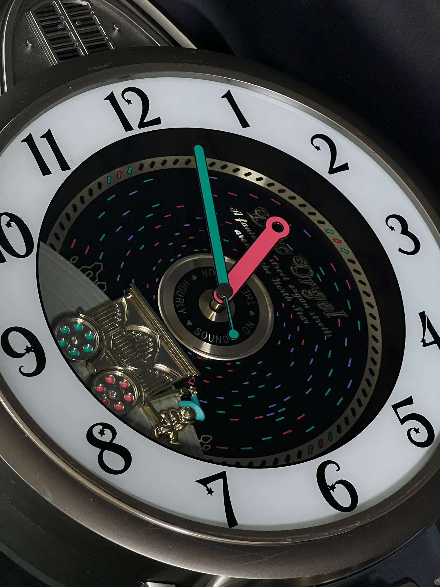 Rhythm "Calliope Phonograph" Magic Motion Musical Wall Clock with Moving Animation - 4MH714RH08