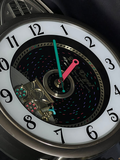 Rhythm "Calliope Phonograph" Magic Motion Musical Wall Clock with Moving Animation - 4MH714RH08