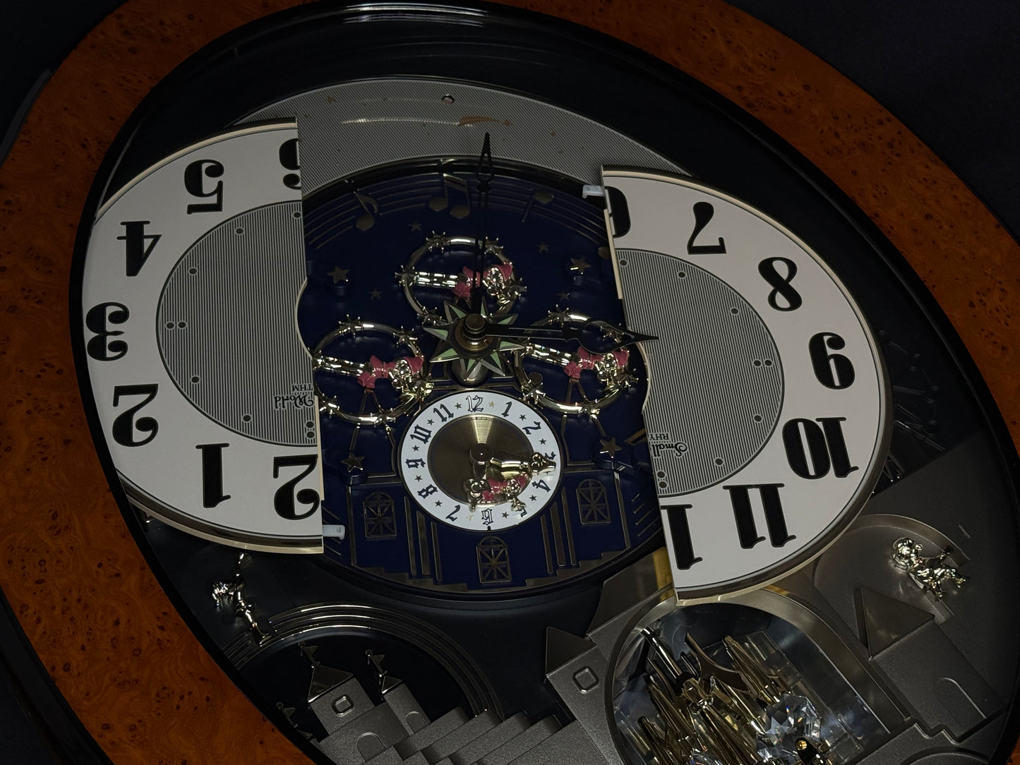 Rhythm “DWS Timecracker” Moving Dial Magic Motion Musical Wooden Wall Clock with Popular Melodies - 4MH752-R06