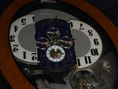 Rhythm “DWS Timecracker” Moving Dial Magic Motion Musical Wooden Wall Clock with Popular Melodies - 4MH752-R06