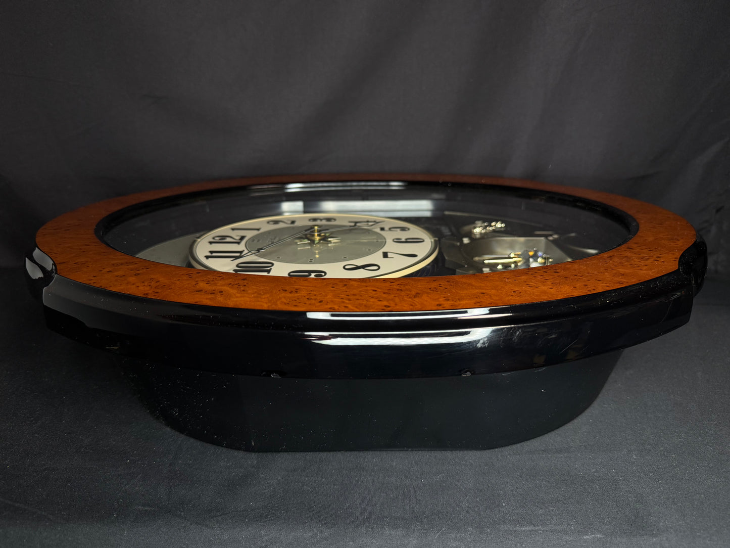 Rhythm “DWS Timecracker” Moving Dial Magic Motion Musical Wooden Wall Clock with Popular Melodies - 4MH752-R06