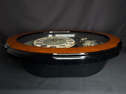 Rhythm “DWS Timecracker” Moving Dial Magic Motion Musical Wooden Wall Clock with Popular Melodies - 4MH752-R06