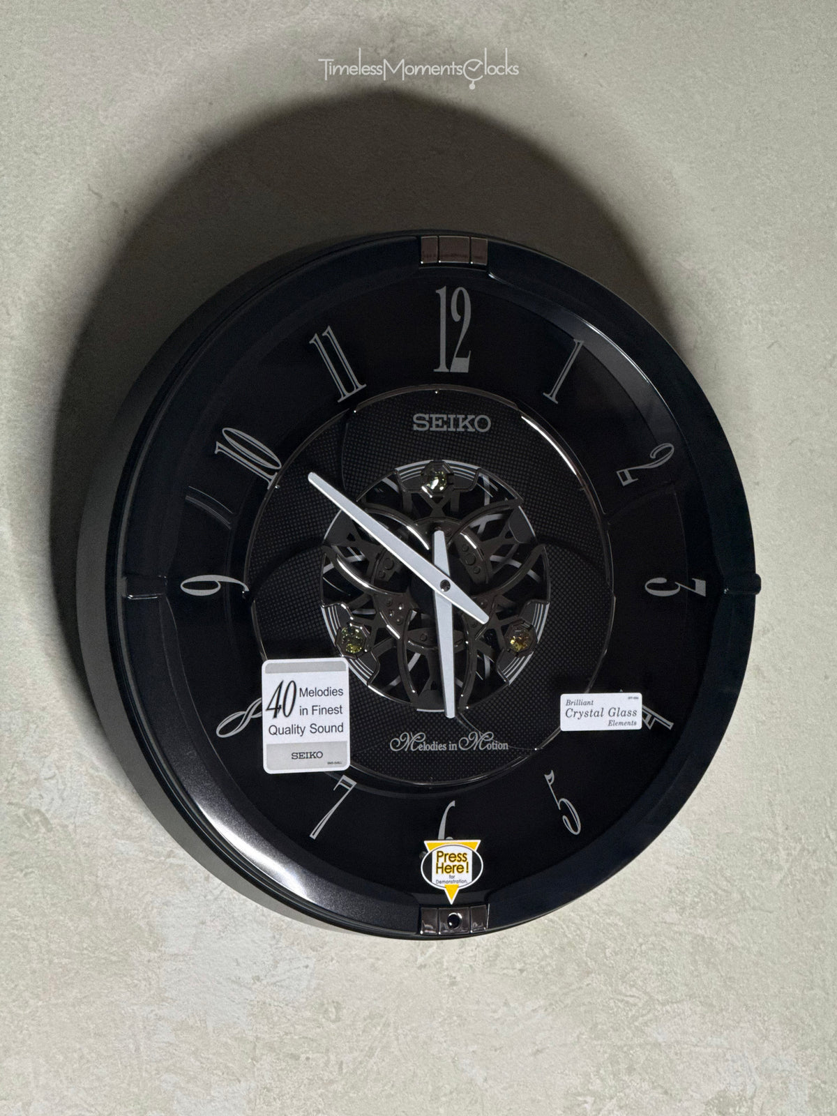 Seiko QXM621KRH “Onyx” Melodies in Motion Dancing Dial Musical Wall Clock with 40 Songs