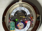 Seiko QXM333BRH "Trumpeting Angels" Melodies in Motion Jaw-Dropping Dial Musical Moving Wall Clock with 13 Songs