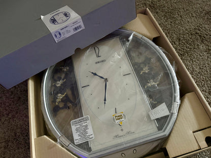 Seiko QXM158SRH "Sparkling Crystals" Melodies in Motion Musical Decorative Pendulum Wall Clock