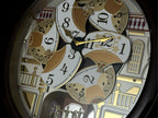 Seiko QXM607BRHZ “Concert Hall” Melodies in Motion Dancing Dial Musical Wall Clock with 45 Songs