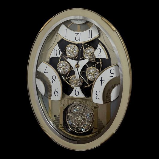 Rhythm "Classic Brilliance" Moving Dial Magic Motion Musical Wall Clock - 4MH787PD18