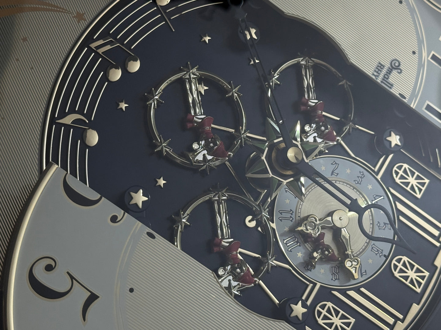 Rhythm "Timecracker Golden Oak" Moving Dial Magic Motion Musical Wooden Wall Clock with Popular Melodies - 4MH782-R07