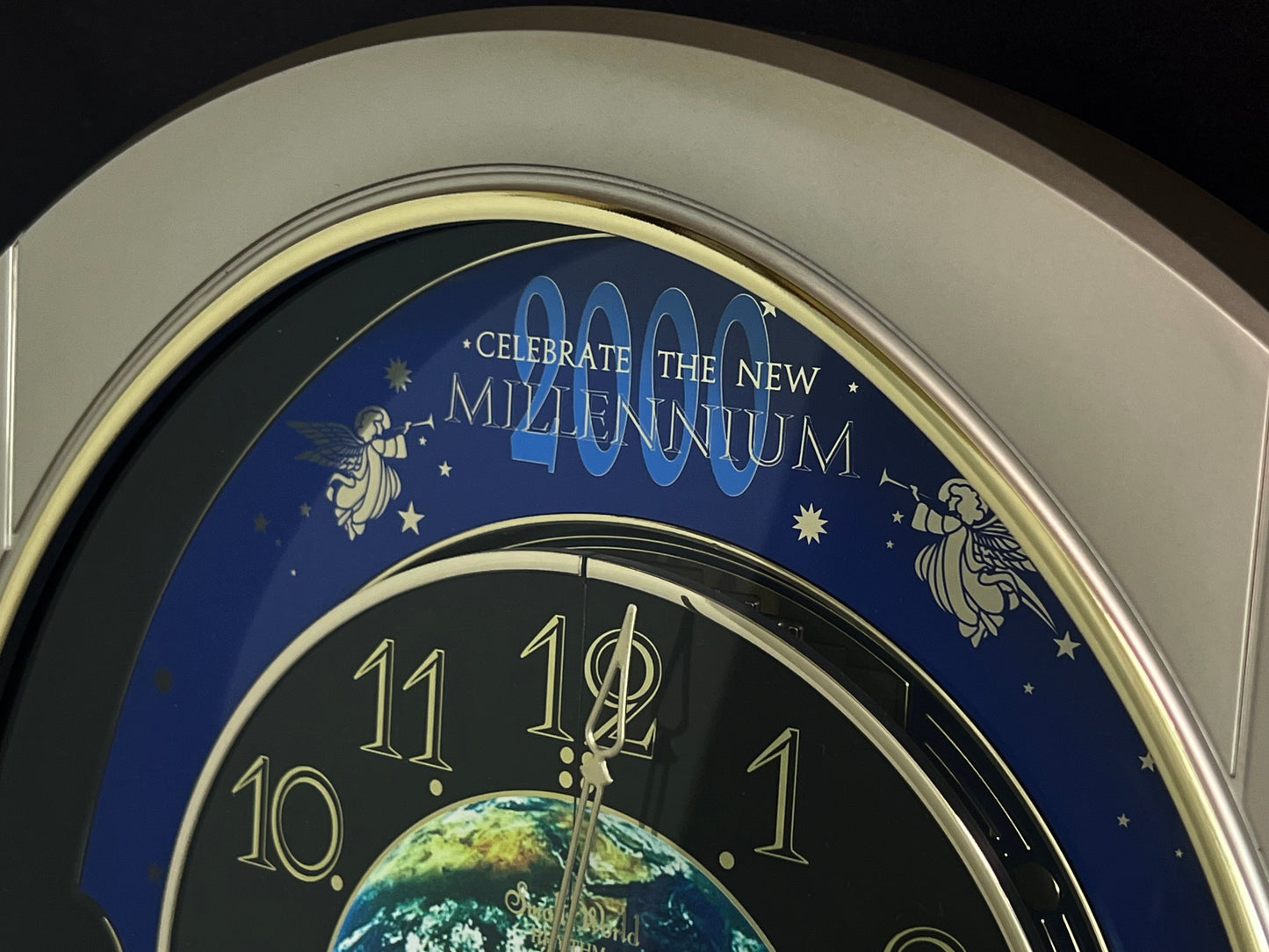 Rhythm “Timecracker 2000” Limited Edition Moving Earth Dial Magic Motion Musical Wall Clock with Popular Melodies - 4MH751NR19