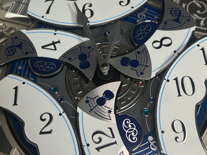 Seiko QXM366SRH “Musical Motifs” Melodies in Motion Dancing Dial Musical Wall Clock