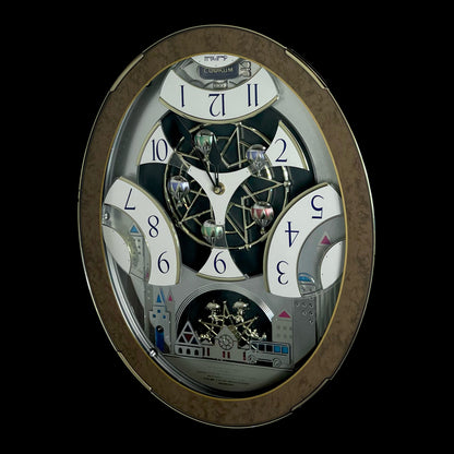Rhythm “Tri-Cracker” Magic Motion Musical Wall Clock with Moving Dial and Balloons - 4MH759NR06