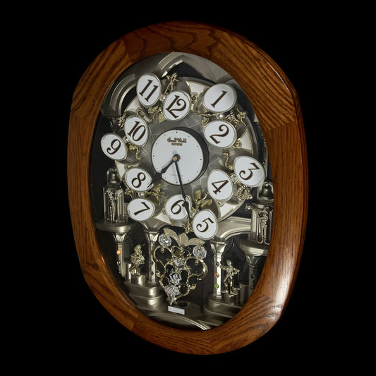 Rhythm "SSS Encore" Magic Motion Musical Wooden Wall Clock with Animated Moving Dial and Popular Melodies - 4MH810-R06