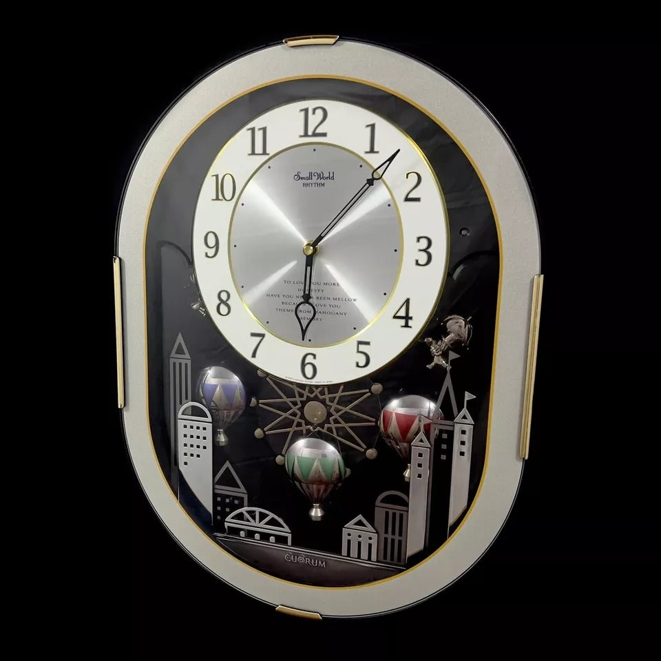 Rhythm "Magic Balloons" Magic Motion Musical Wall Clock with Animated Figurines - 4MH758-R08