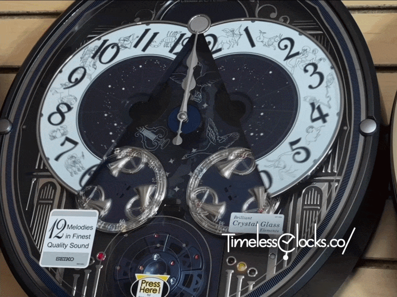 Seiko QXM393NRH “Galaxy Constellations” Astrology-Themed Melodies in Motion Moving Dial Musical Wall Clock with Luminous Dial & 12 Songs